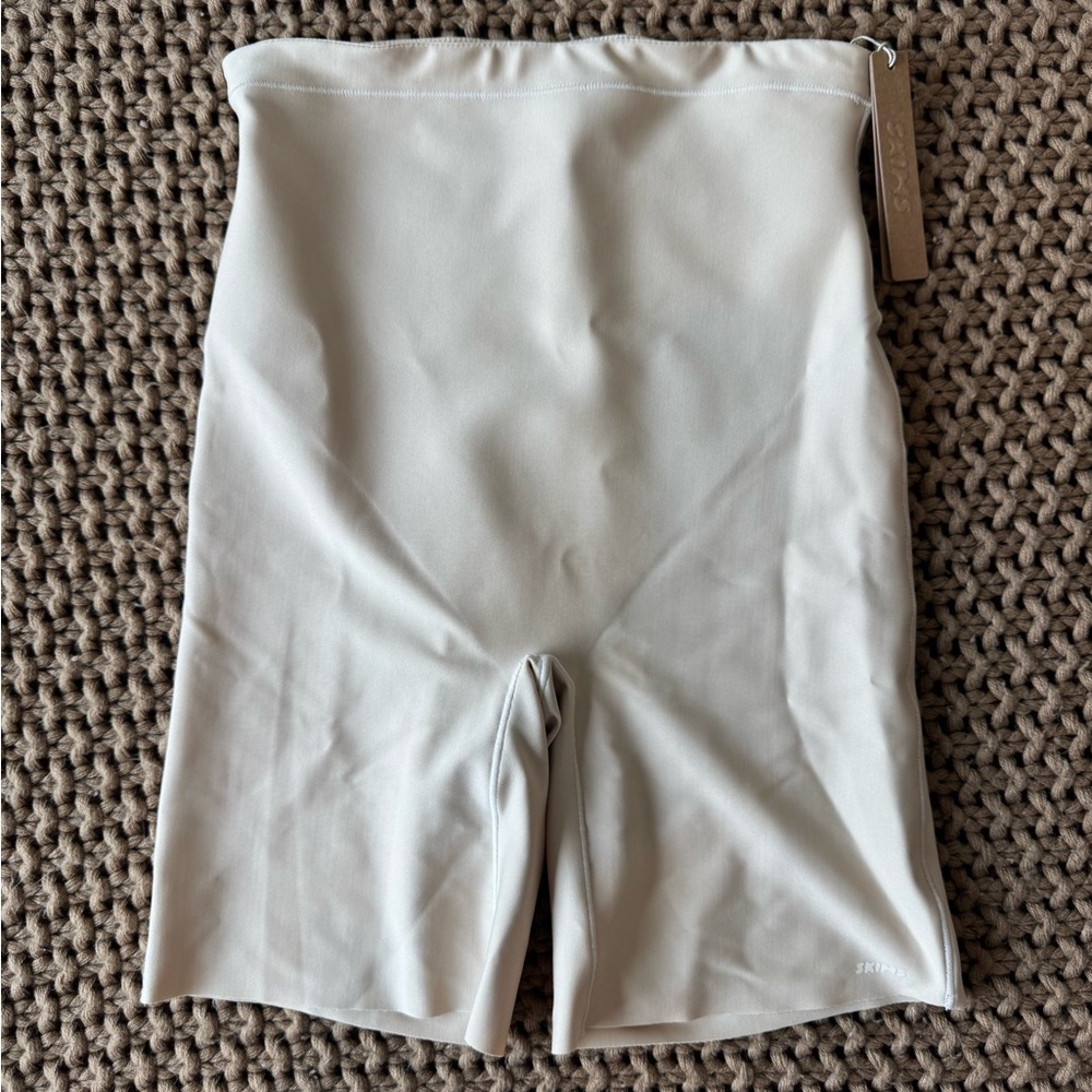 SKIMS Sculpting High-Waist Shaper Shorts in Light Beige